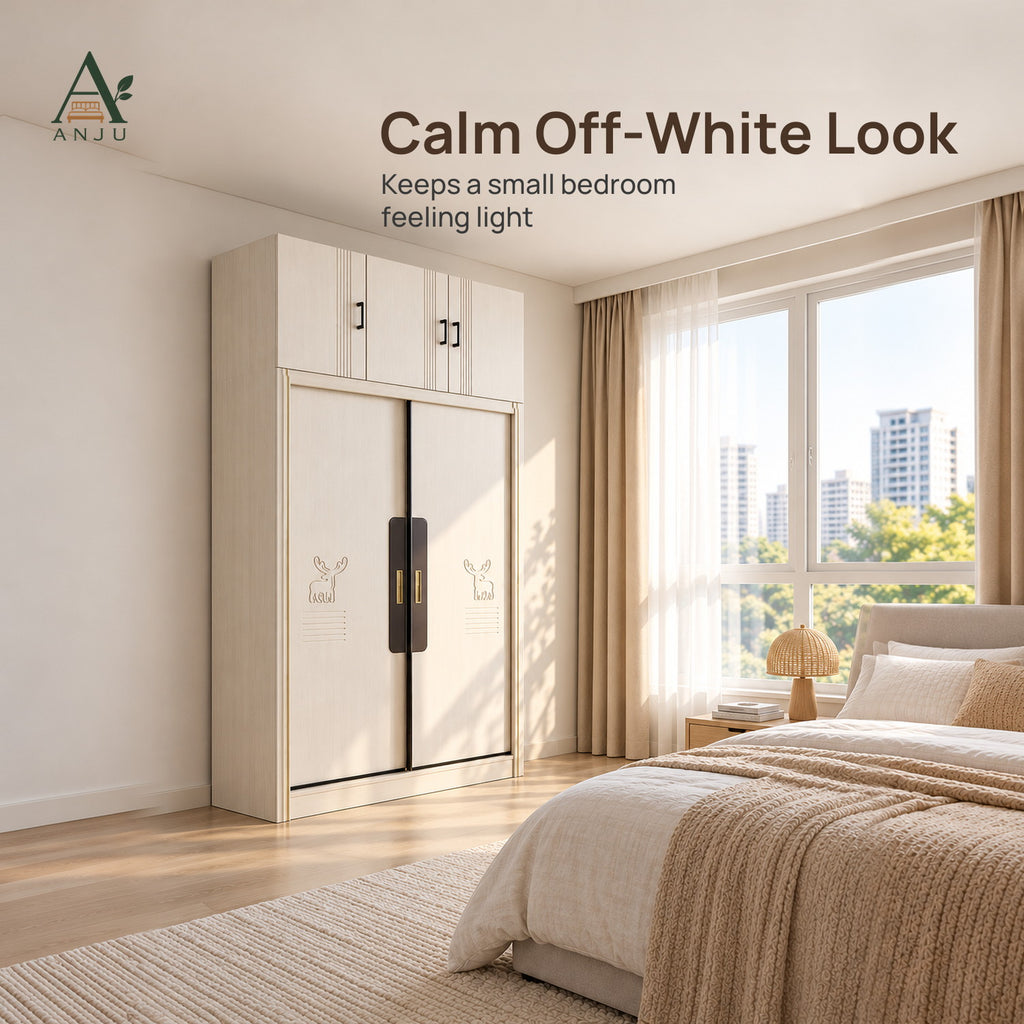 White 2-door sliding wardrobe with top cabinets in a bedroom with a bed, large window and sheer curtains