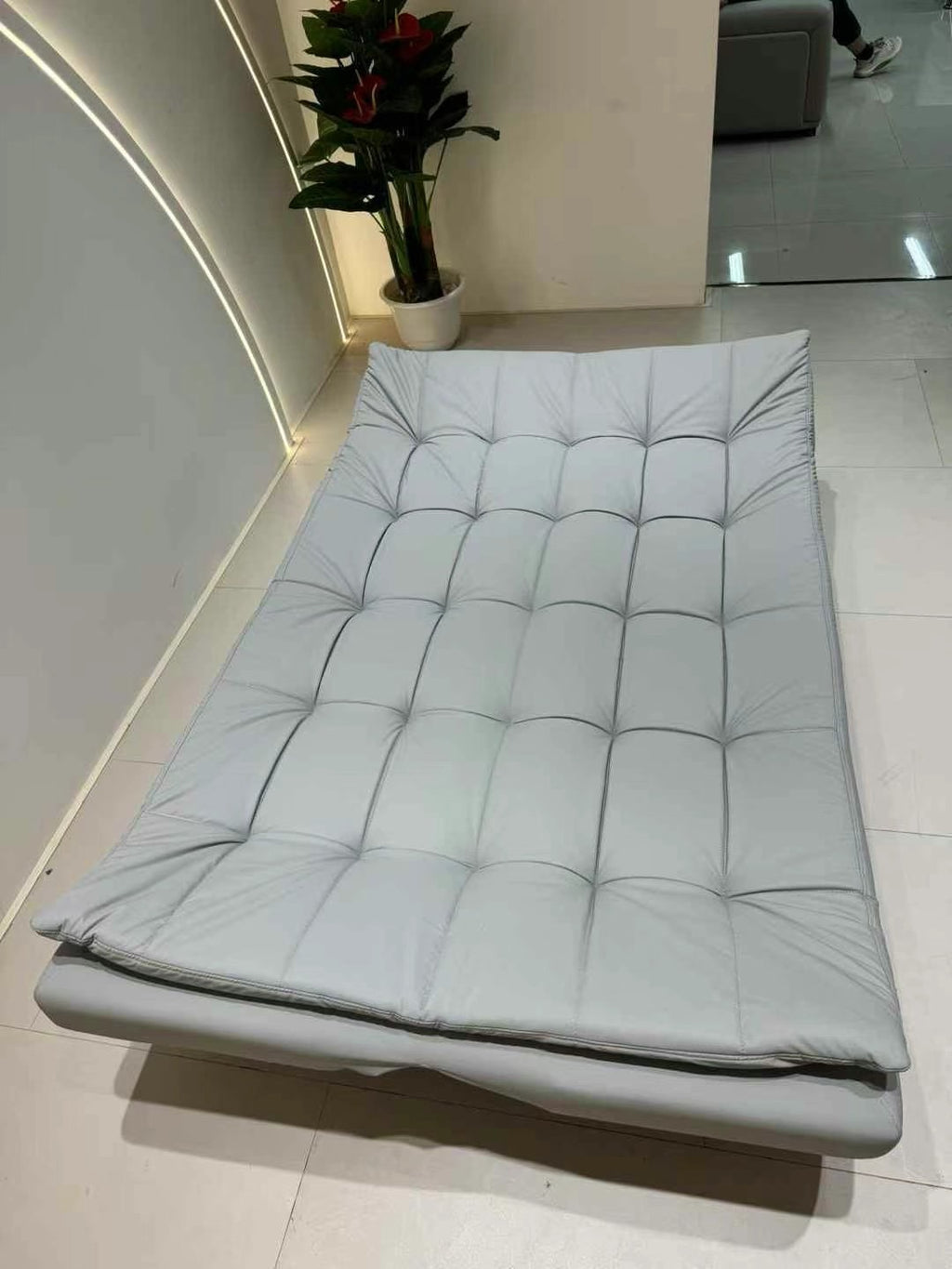 ANJU Foldable Sofa Bed with Button-Tufted Back and Chrome Angled Legs, Leather-Look Fabric, 183 cm