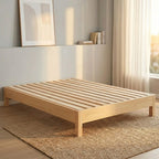 ANJU pine wood low platform bed frame with slatted base in a bedroom scene