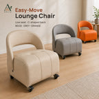 ANJU low lounge chair with caster wheels and a C-shaped back in beige, grey and orange